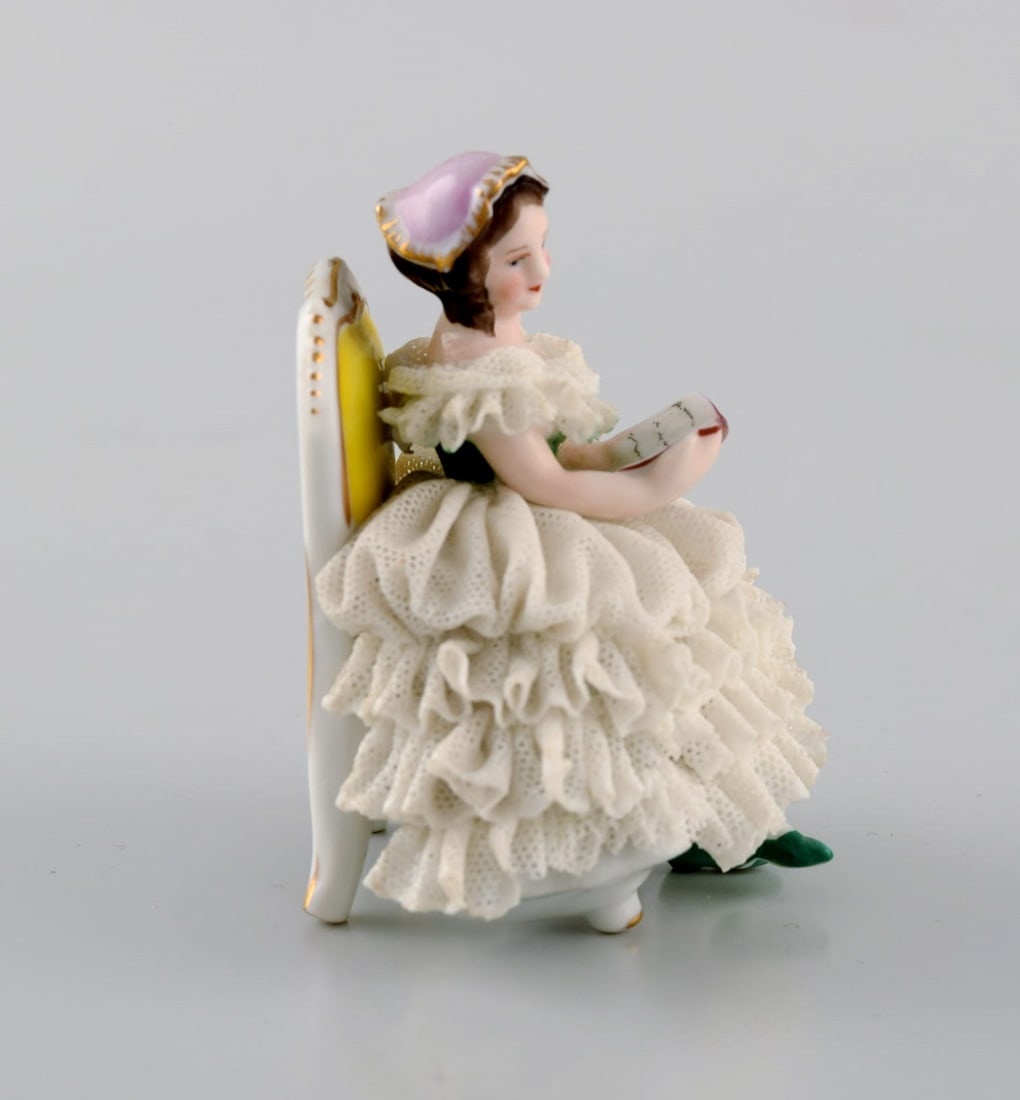 Volkstedt Rudolstadt, Germany. Porcelain figure. Reading woman in skirt. Mid-20th century. - 3