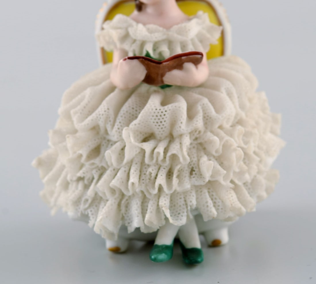 Volkstedt Rudolstadt, Germany. Porcelain figure. Reading woman in skirt. Mid-20th century. - 5