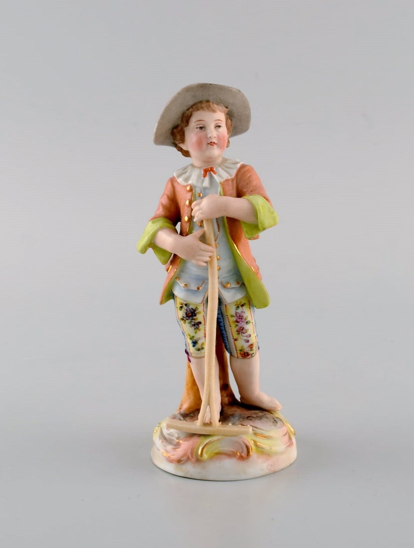 German porcelain figurine. Young gardener. 20th century. (1 of 9)