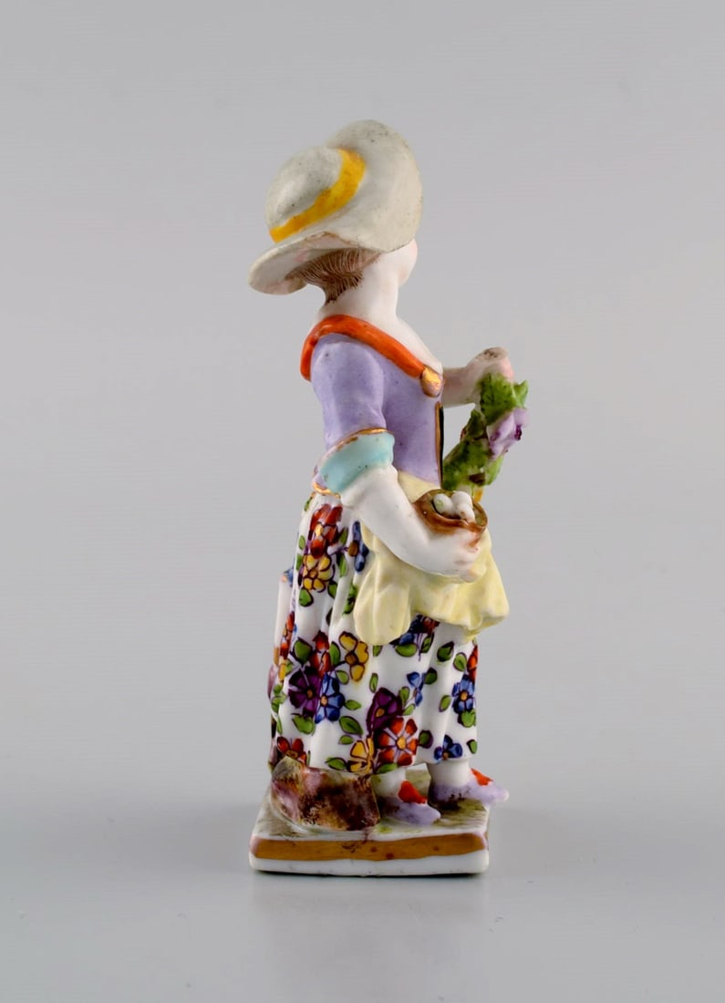 Augustus Rex, Germany. Antique hand-painted porcelain figure. Girl with flowers and fruit. 19th - 7