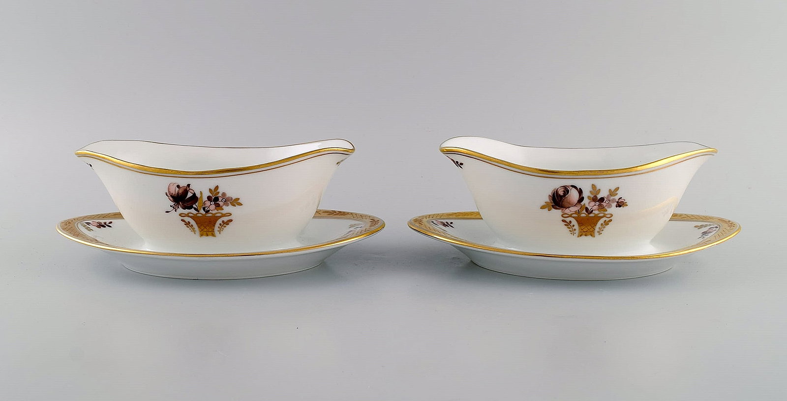 Two Royal Copenhagen Golden Basket sauce bowls in porcelain with flowers and gold decoration. Model (1 of 7)