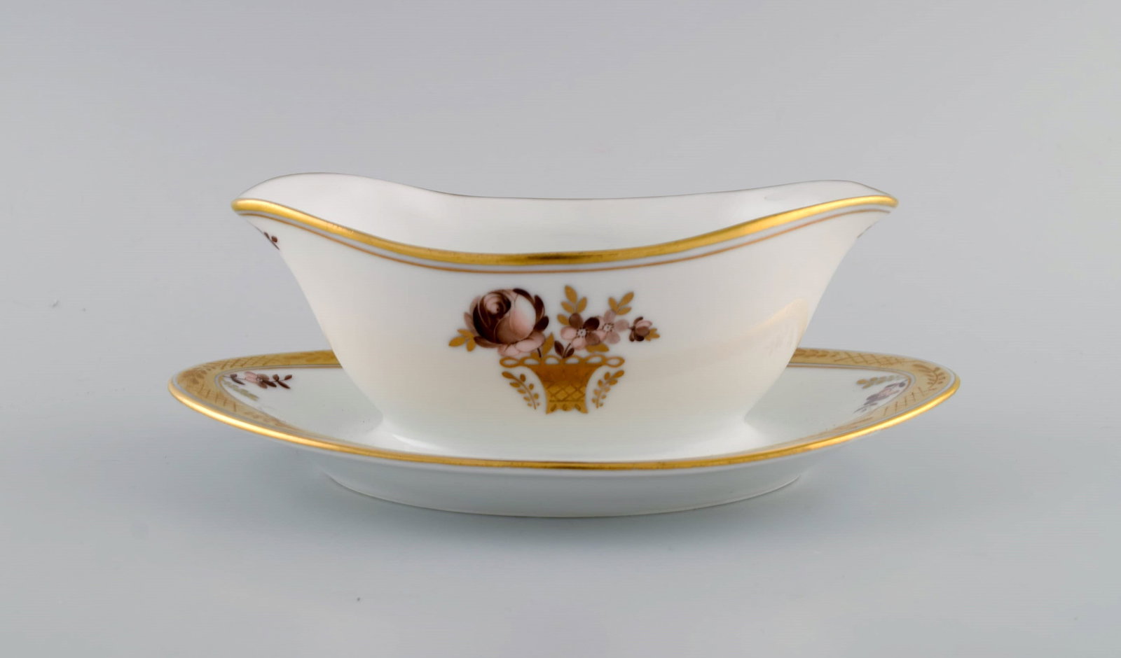 Two Royal Copenhagen Golden Basket sauce bowls in porcelain with flowers and gold decoration. Model - 3