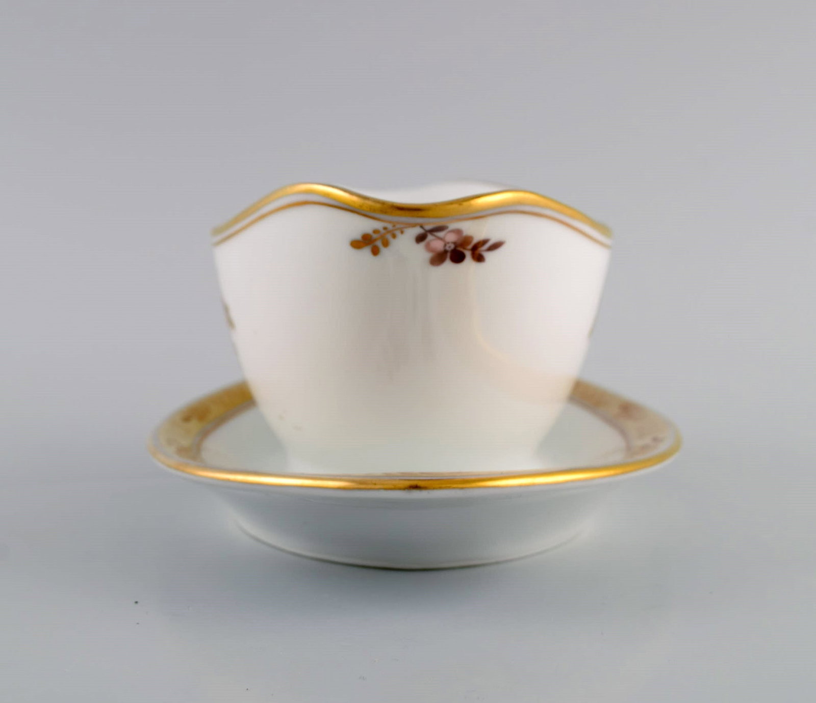 Two Royal Copenhagen Golden Basket sauce bowls in porcelain with flowers and gold decoration. Model - 4