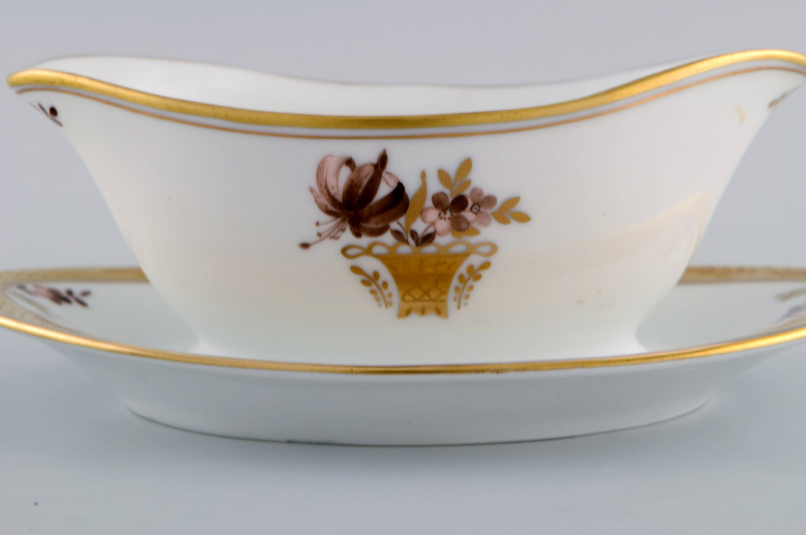 Two Royal Copenhagen Golden Basket sauce bowls in porcelain with flowers and gold decoration. Model - 6