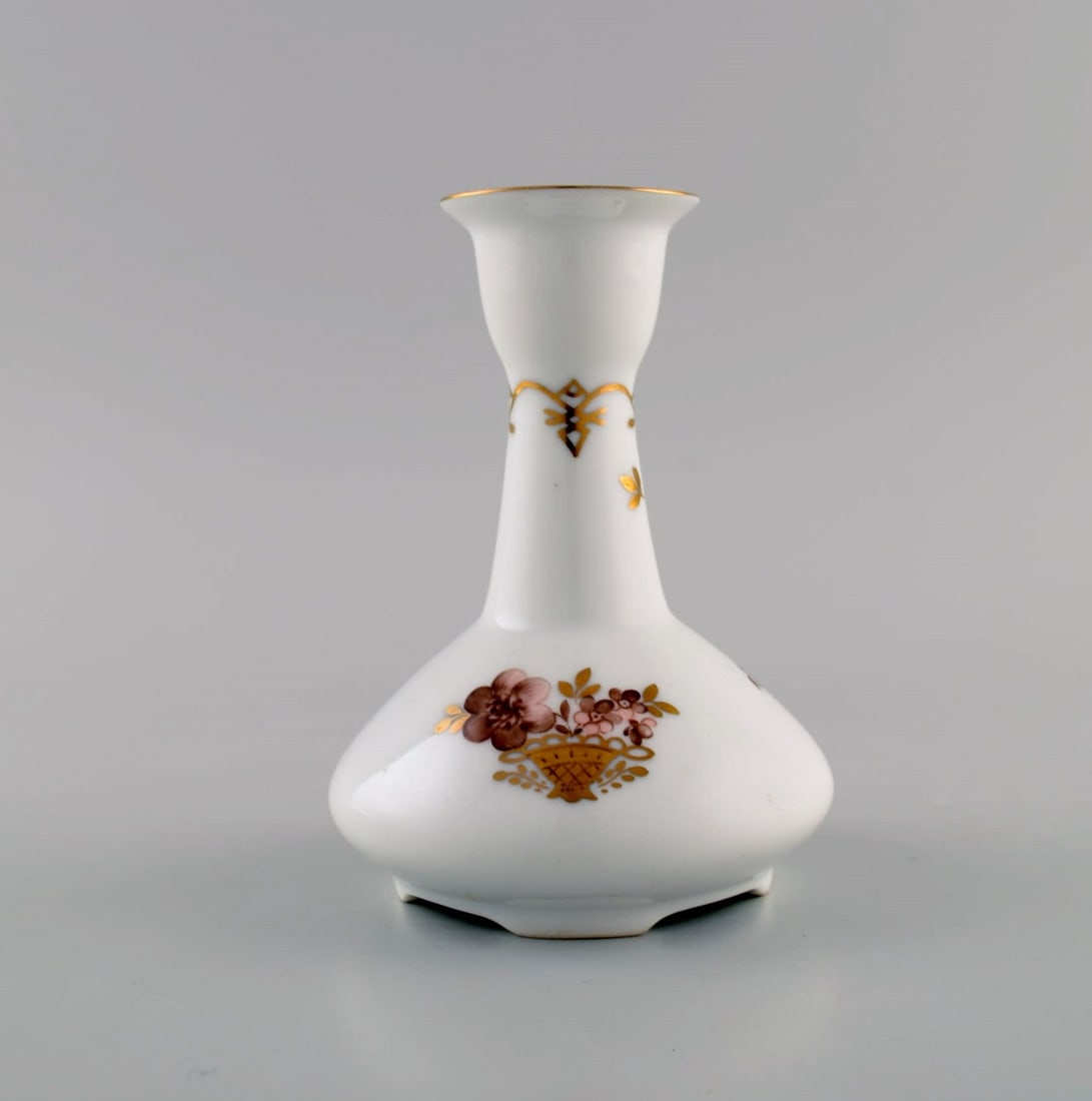 Two Royal Copenhagen Golden Basket candlesticks in porcelain with flowers and gold decoration. Model - 4