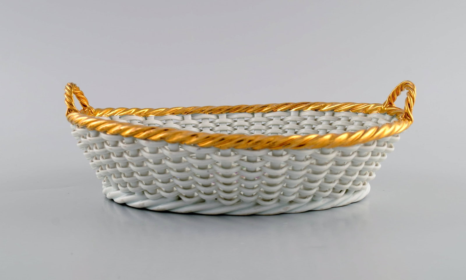 Antique Meissen braided porcelain basket with handles. Hand-painted flowers and golden border. Late - 7