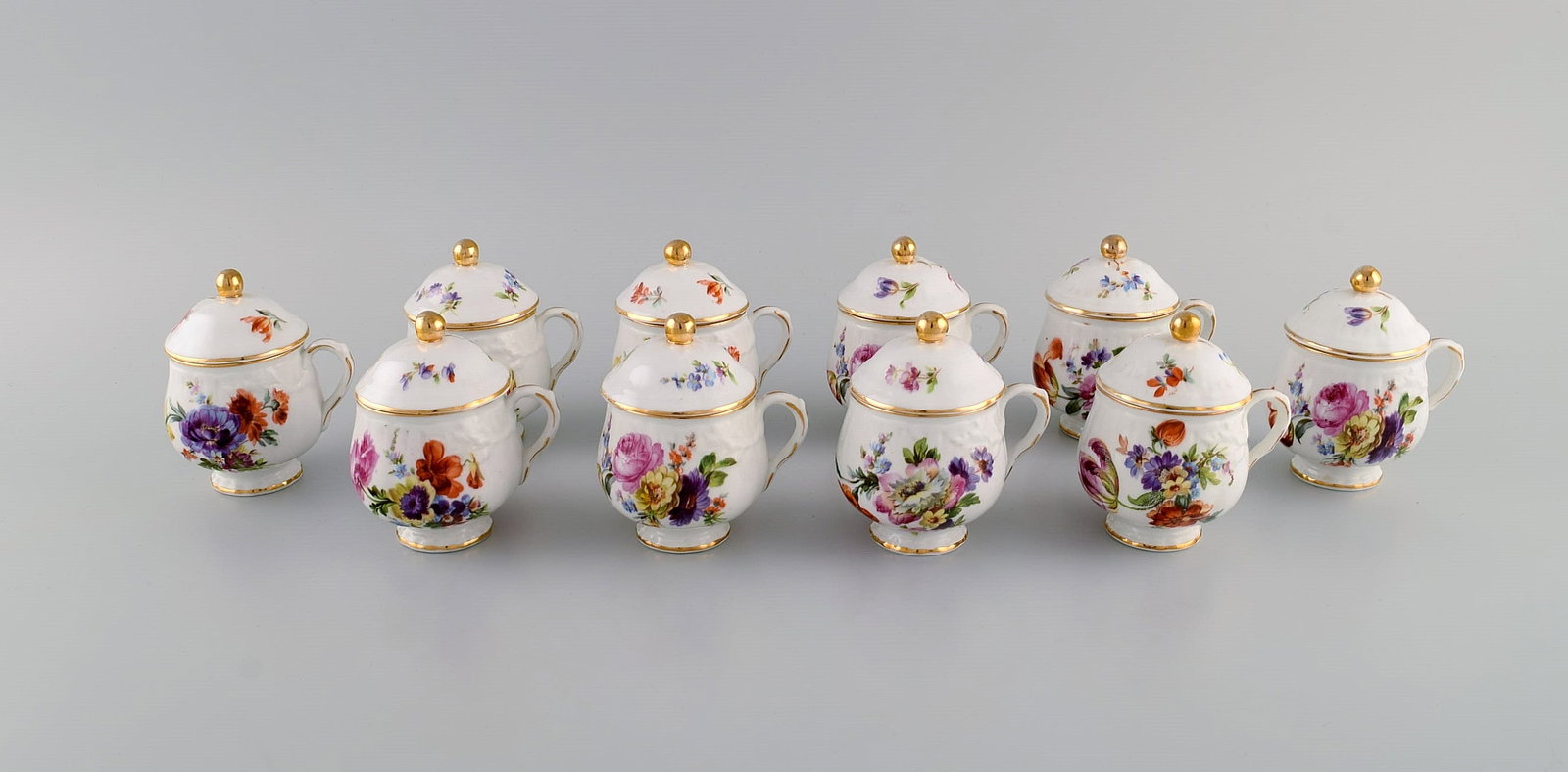 10 antique Rorstrand porcelain cream cups with hand-painted flowers and gold decoration. Approx. - 2