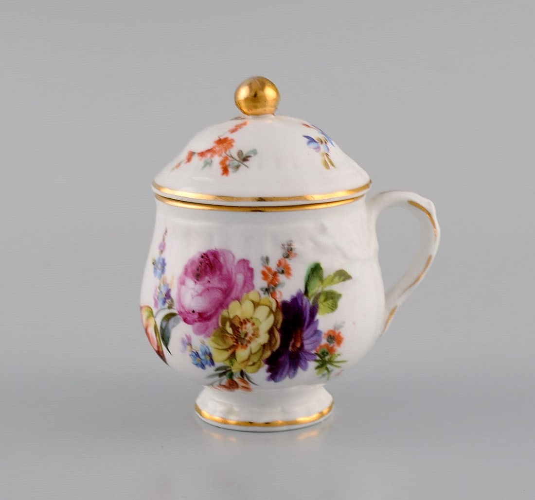 10 antique Rorstrand porcelain cream cups with hand-painted flowers and gold decoration. Approx. - 4