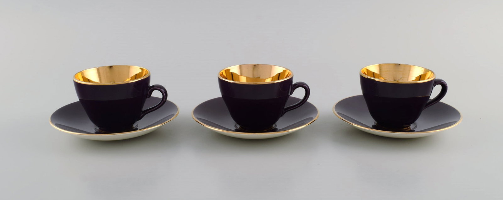 Three Royal Copenhagen / Aluminia Confetti mocha cups with saucers in purple glazed faience with (1 of 7)