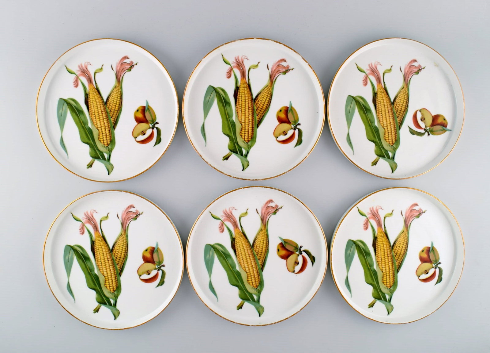 Royal Worcester, England. Six round porcelain dishes decorated with corn cobs, apples and gold edge. - 8