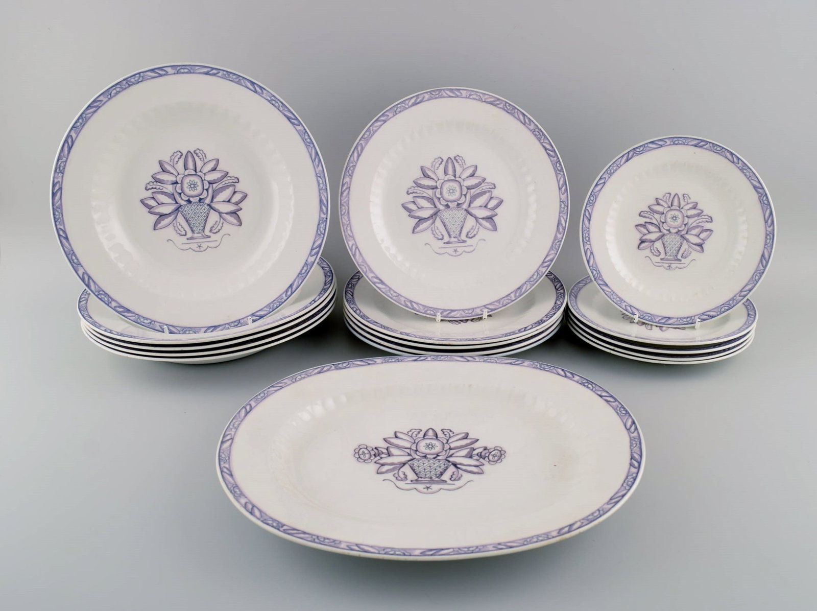 Wilhelm Kage for Gustavsberg. Vas serving dish and fifteen plates in hand-painted faience. 1920s / (1 of 8)