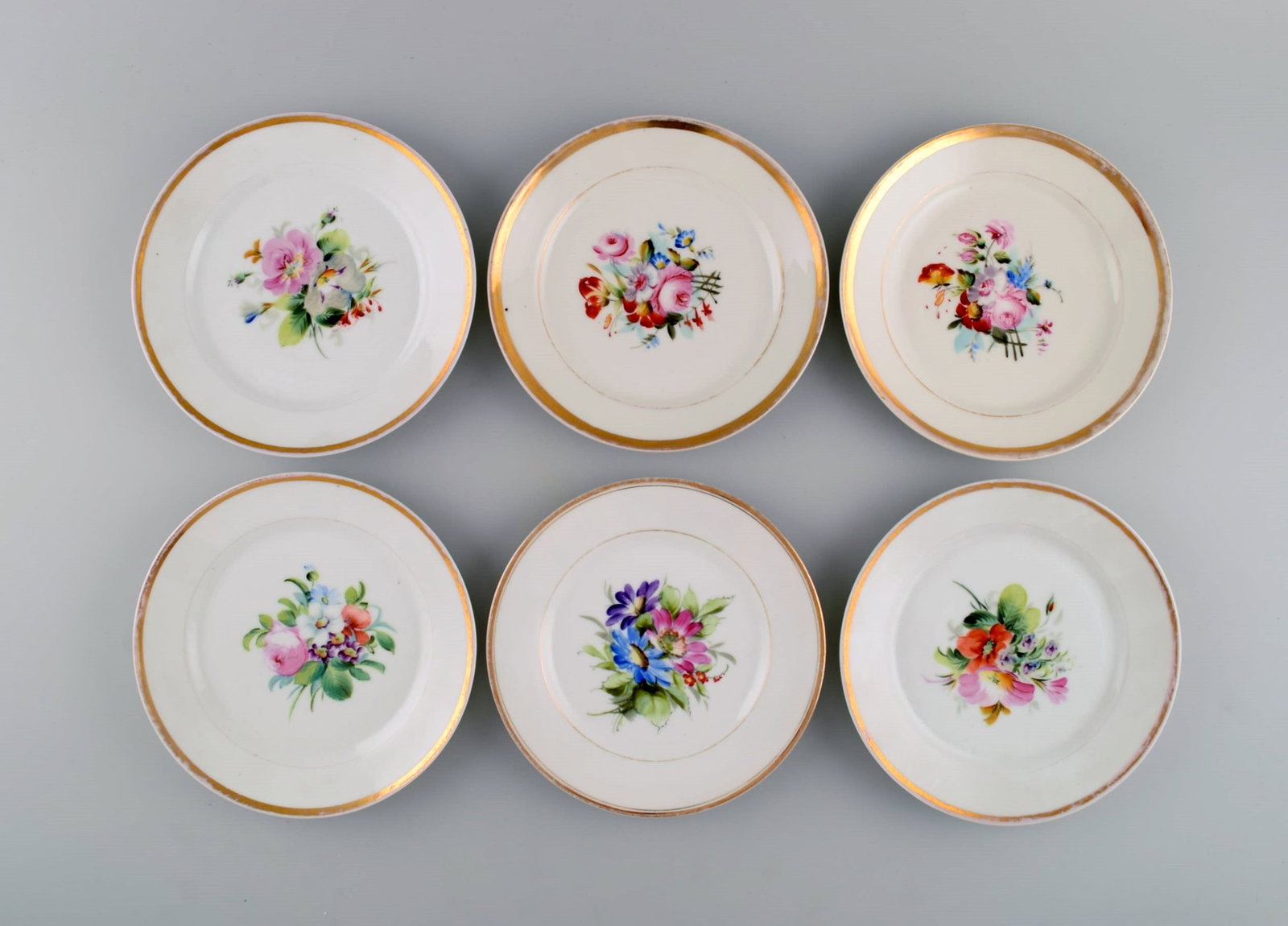 Six antique Bing & Grondahl plates in porcelain with hand-painted flowers and a gold edge. Late 19th (1 of 7)