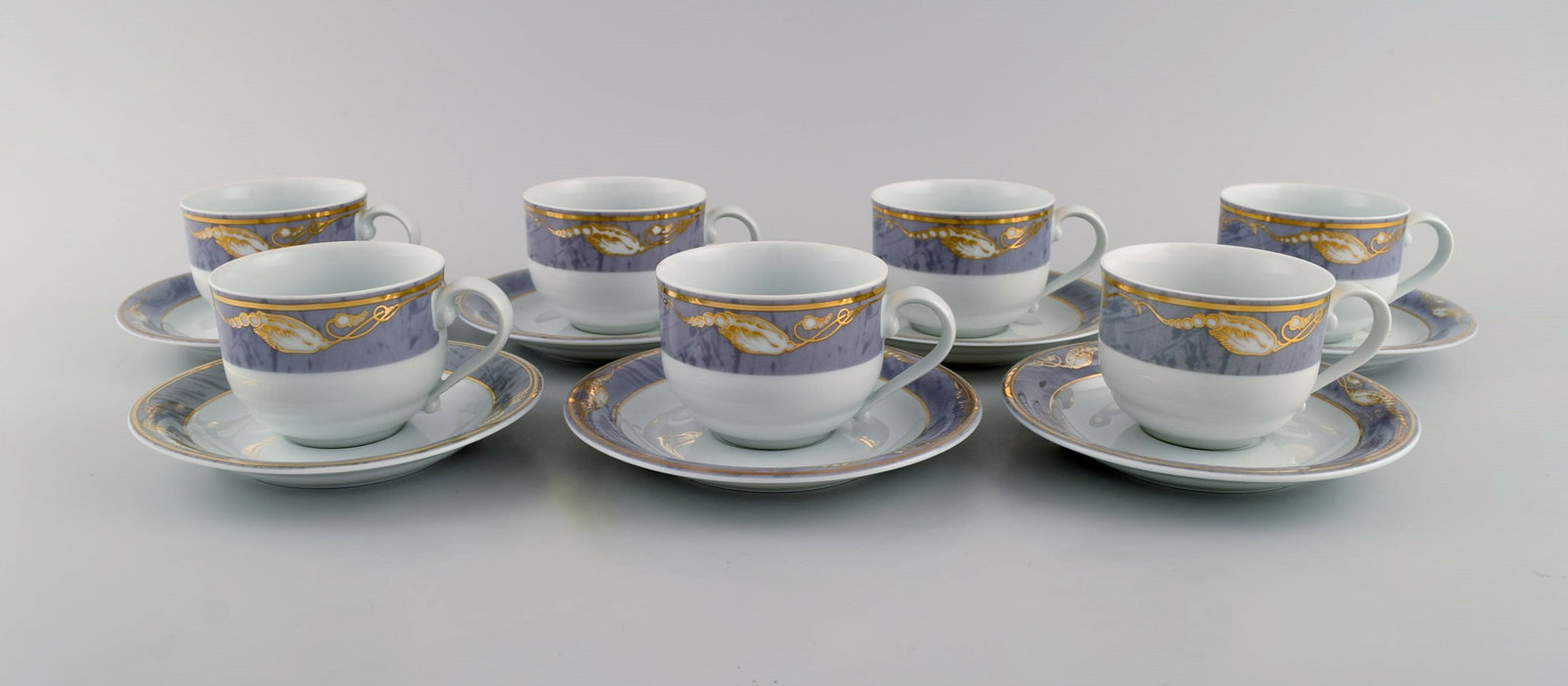 Seven Royal Copenhagen Gray Magnolia coffee cups with saucers in porcelain. Late 20th century. - 2