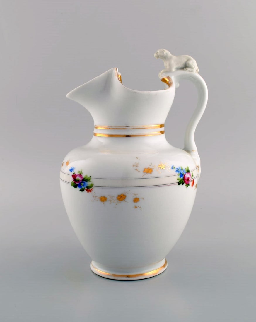Antique Bing & Grondahl chocolate jug in porcelain modeled with a lion on the handle. Hand-painted (1 of 9)
