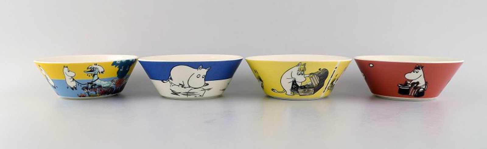Arabia, Finland. Four porcelain bowls with motifs from "Moomin". Late 20th century.: Title: Arabia, Finland. Four porcelain bowls with motifs from "Moomin". Late 20th century. Description: Arabia, Finland. Four porcelain bowls with motifs from "Moomin". Late 20th century. In excellent