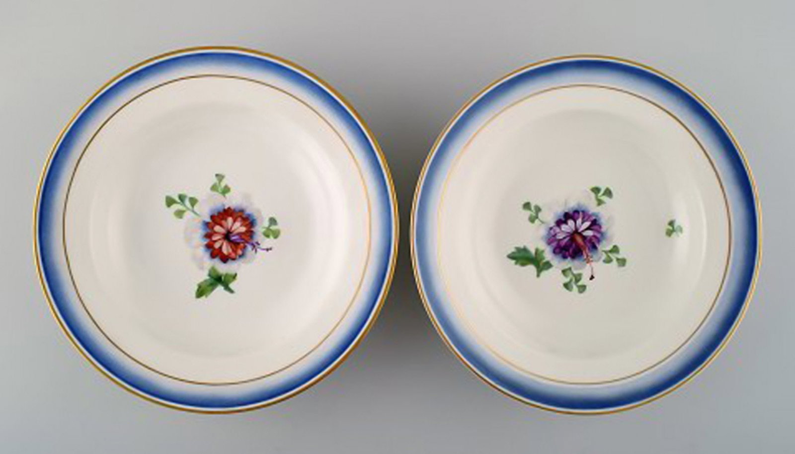 Four antique Royal Copenhagen deep plates in hand-painted porcelain with flowers and blue edge with - 3