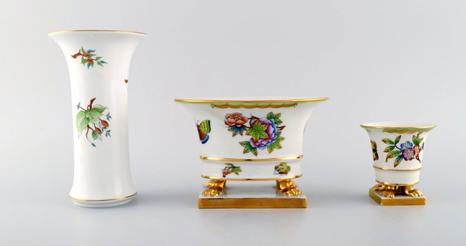 Three Herend vases in hand-painted porcelain with flowers and gold decoration. Mid-20th century. (1 of 9)