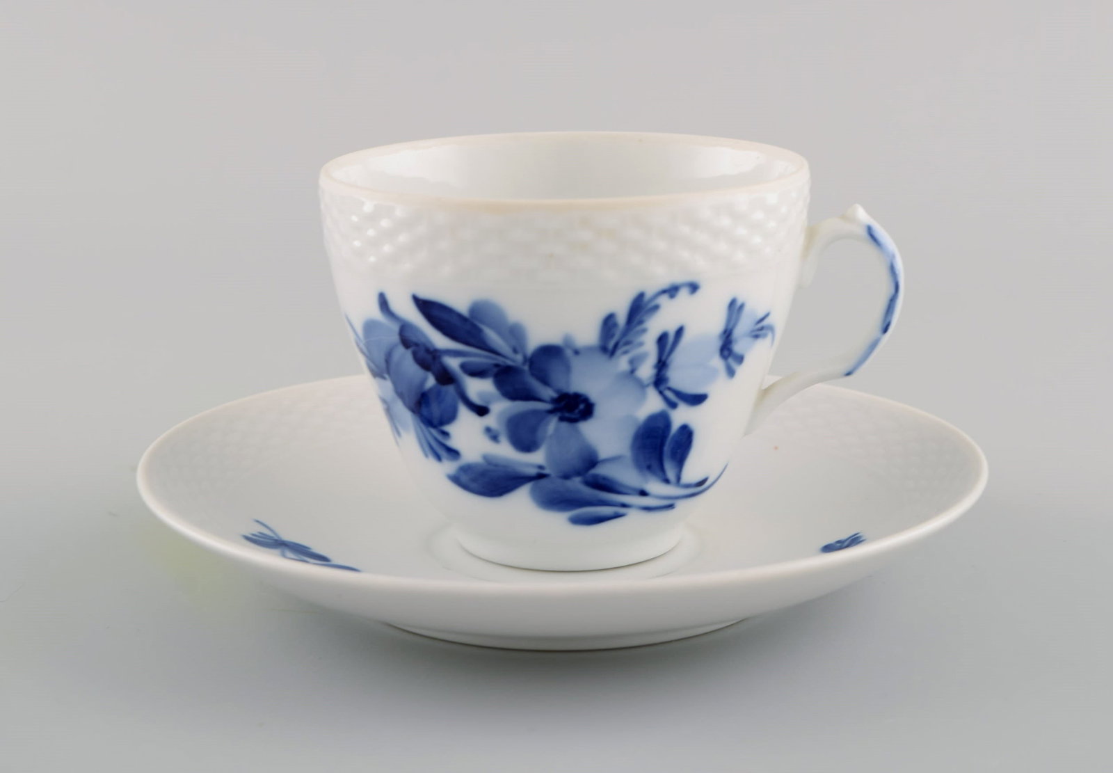 Eight Royal Copenhagen Blue Flower Braided coffee cups with saucers. Mid 20th century. Model number - 3