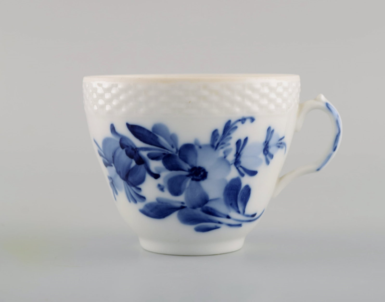 Eight Royal Copenhagen Blue Flower Braided coffee cups with saucers. Mid 20th century. Model number - 4