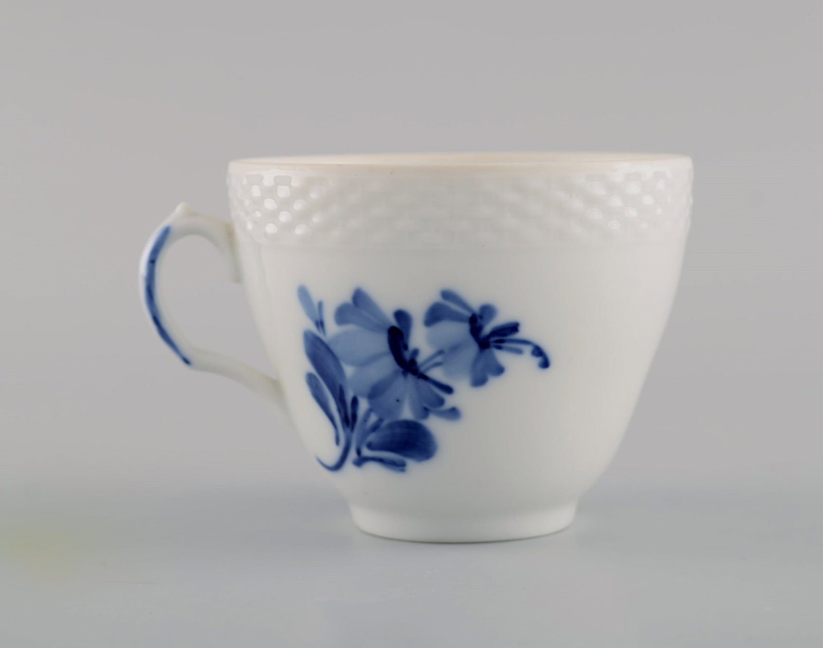 Eight Royal Copenhagen Blue Flower Braided coffee cups with saucers. Mid 20th century. Model number - 5