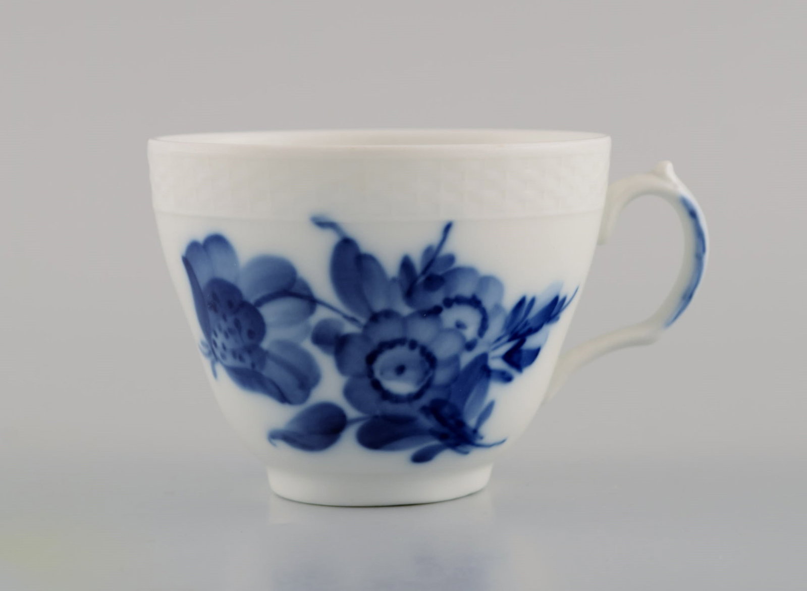 Five Royal Copenhagen Blue Flower Braided coffee cups with saucers. Mid 20th century. Model number - 4