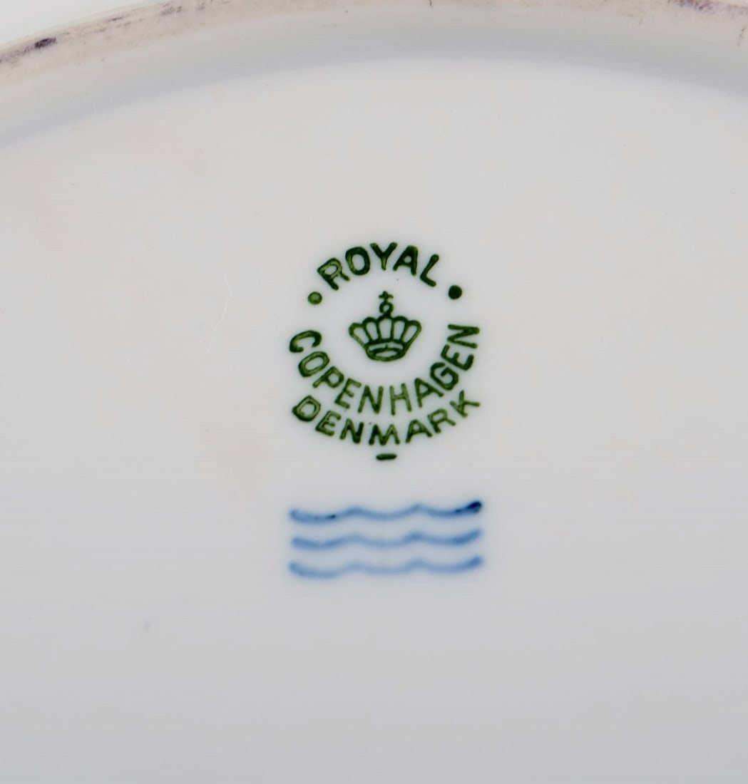 Royal Copenhagen plate in hand-painted porcelain with floral motif and edge in light green and gold. - 6
