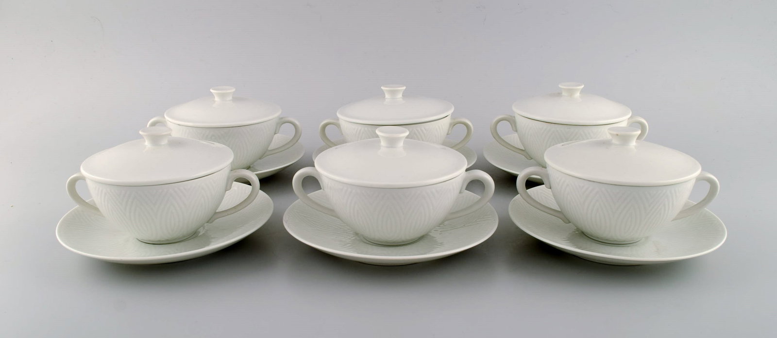 Royal Copenhagen. Salto Service, White. Six bouillon cups with saucers. 1960s. - 2