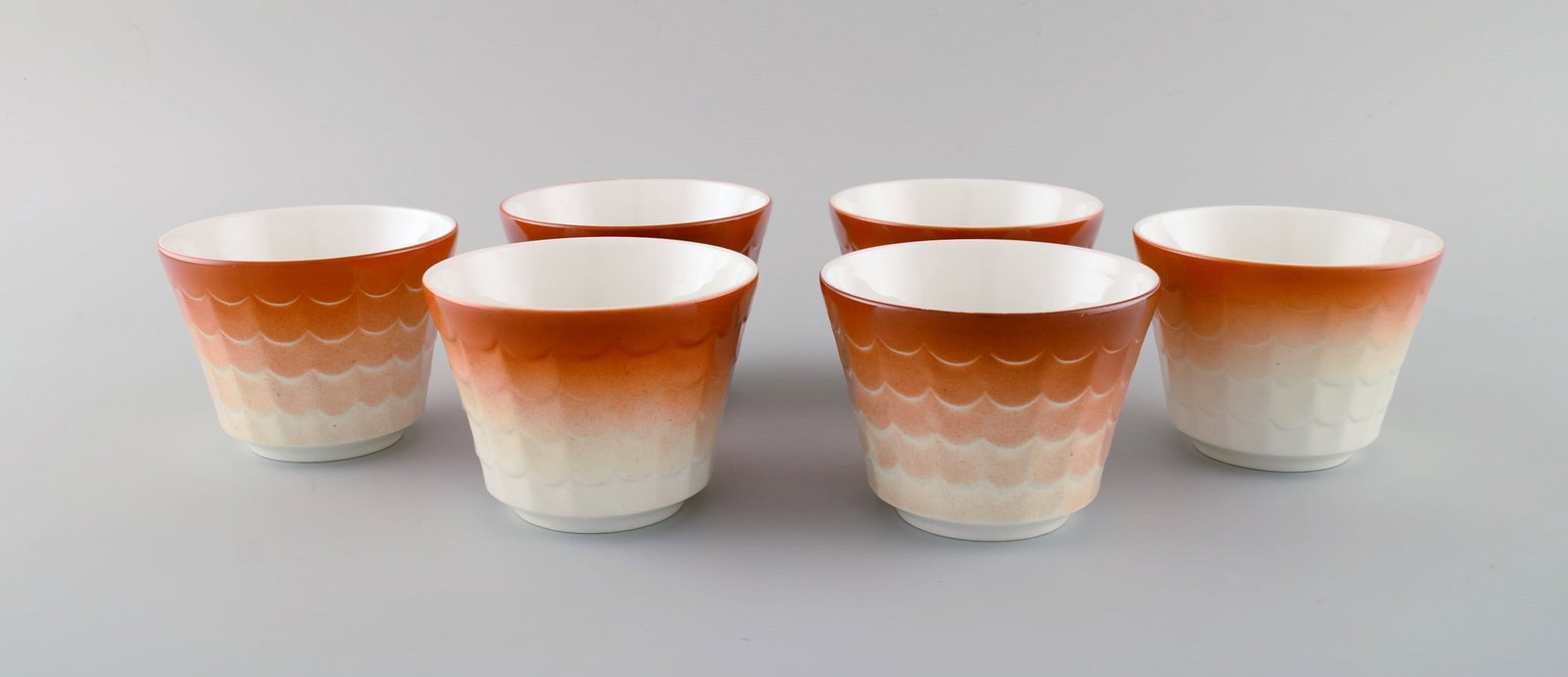 Wilhelm Kage for Gustavsberg. Six flower pot covers in porcelain. Swedish design, 1960s. - 2