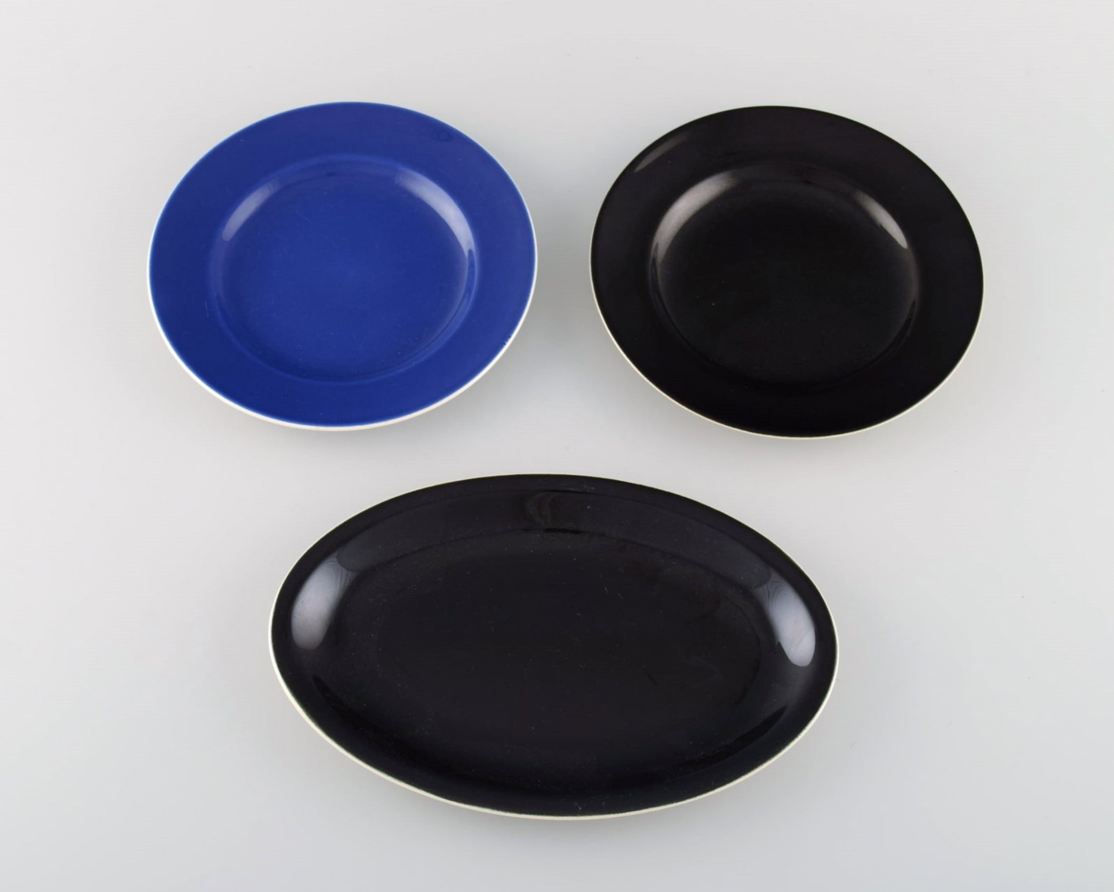 Royal Copenhagen / Aluminia Confetti dish and two plates in black and blue glazed faience. Mid-20th (1 of 6)
