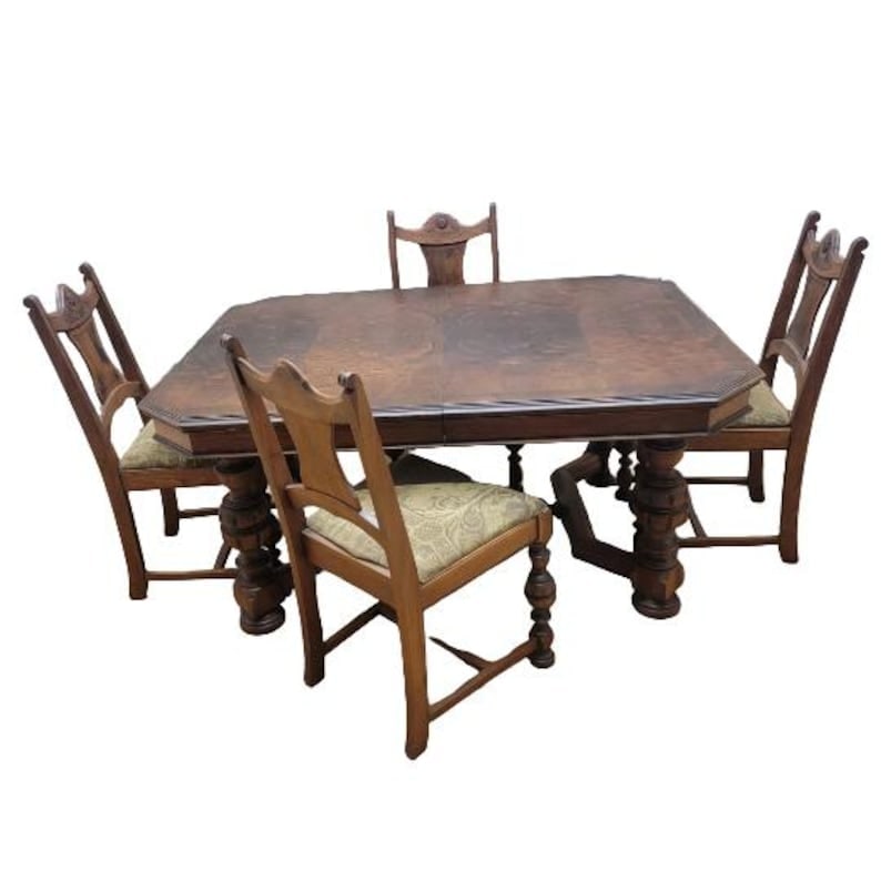 American Traditional Tudor Revival Dining Table with Four Chairs: Vintage American Hardwood Dining Table and Chairs - Set of 5 This vintage hardwood dining table and four chairs was made in the USA. All of the chairs are upholstered with cream and olive green