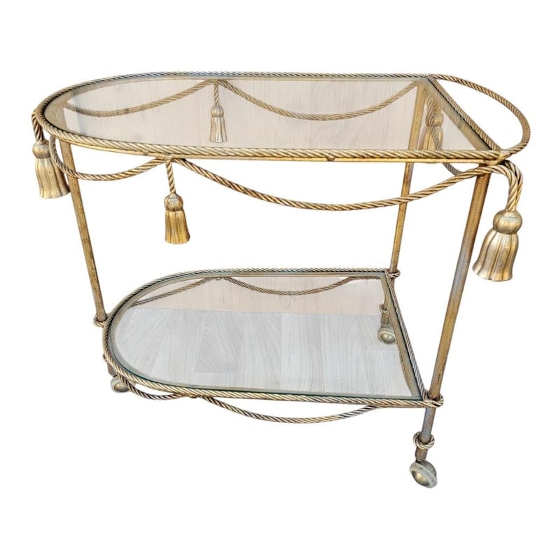 Hollywood Regency Italian Gilt Rope & Tassle Drinks Trolley Bar Cart: Vintage Hollywood Regency Italian Gilt Rope & Tassle Drinks Trolley Bar Cart This fabulous Italian mid century Hollywood Regency gilt-tole drinks trolley with gold twisted rope and tassel details. Cir