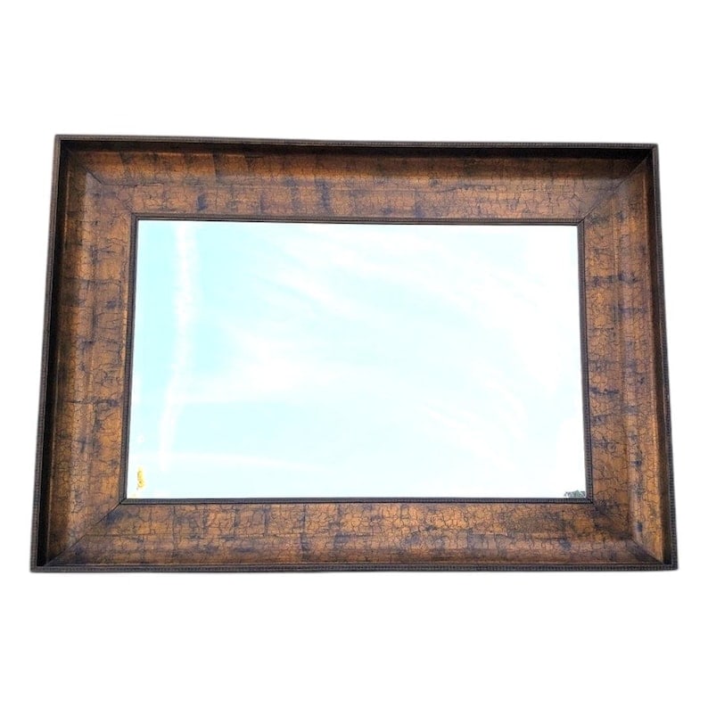 Vintage Oversized Antique Gold Beveled Wall Mirror: .Vintage Antique Gold Rectangular Beveled Wall Mirror This vintage oversized wall mirror features an antiqued gold rectangular frame that adds a touch of elegance to any space. The beveled edges
