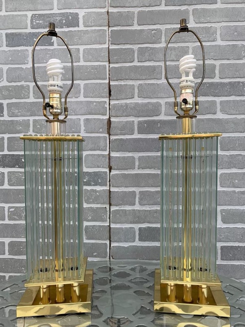 Mid Century Gaetano Sciolari Brass and Glass Rods Table Lamps - Pair: Mid Century Gaetano Sciolari Brass and Glass Rods Table Lamps - Pair Gaetano Sciolari for Lightolier table lamps in brass with multiple glass rods. Illumination comes from a single socket above for st