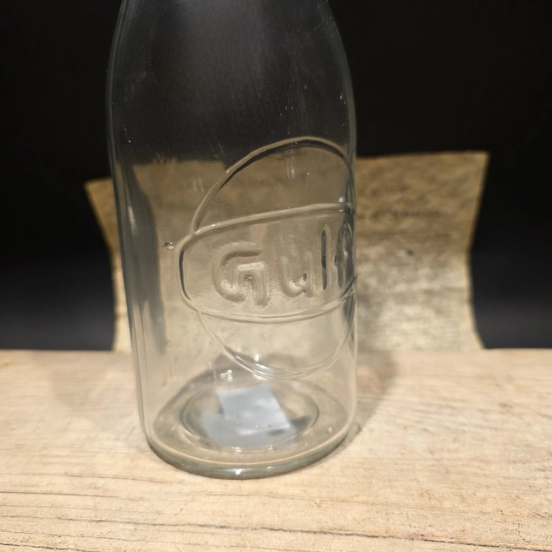1930s Style Glass Gulf Oil Bottle w Spout: 3.5 W x 17 H Wonderful vintage style reproduction Gulf motor oil bottle with its spout. Such a neat reproduction glass oil bottle. Wonderful signs of wear and distress. Hard to tell its age! Looks gre