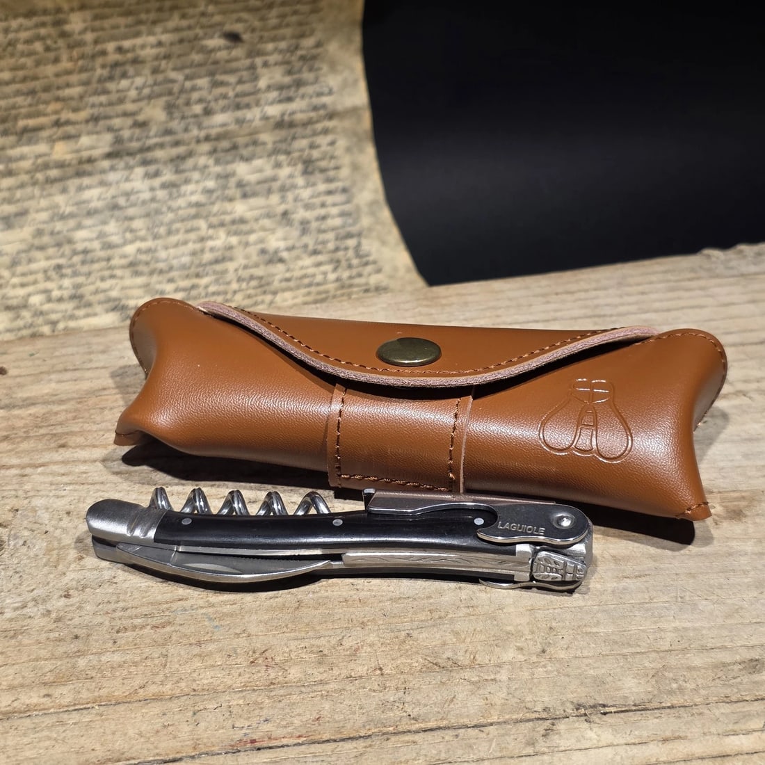 Laguiole Corkscrew with Black Horn Handles Leather Pouch: 4 1/2" long x 5/8" Wide Nice quality, brand new, never used heavy waiters style Laguiole corkscrew with bovine ox horn handles, stainless steel. The corkscrew features a ribbed worm for steady cork