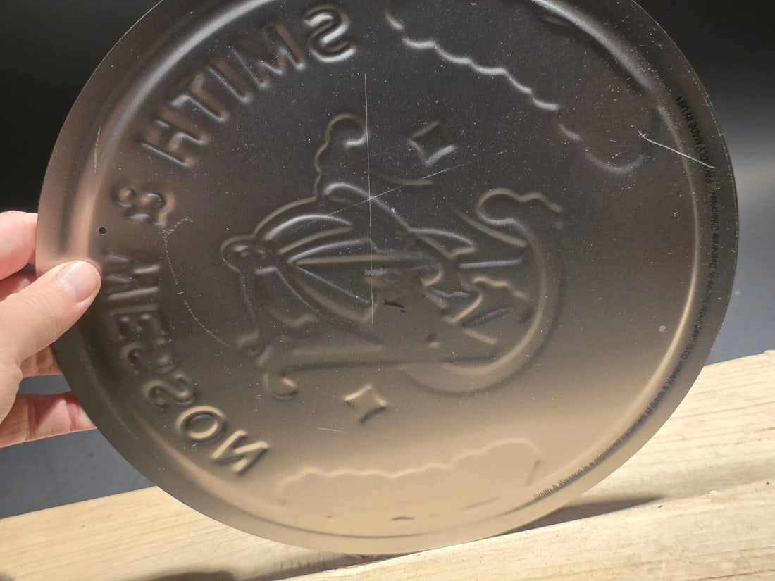11 1/2" Round Metal Smith & Wesson Sign - 6