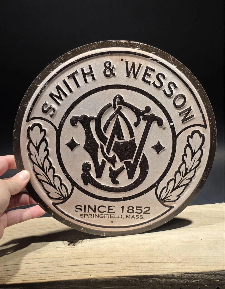 11 1/2" Round Metal Smith & Wesson Sign - 9