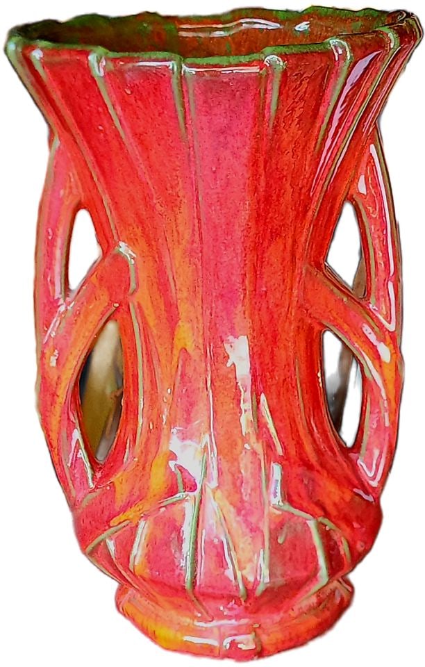 Exceptional Mid-Century McCoy Strap Ribbon Vase, likely from the 1940s. A collector level item.: This vase features a vibrant red-orange glaze with green accents, and a distinctive "ribbon strap" design with cutouts and double handles. McCoy pottery is a well-known American art pottery company, a