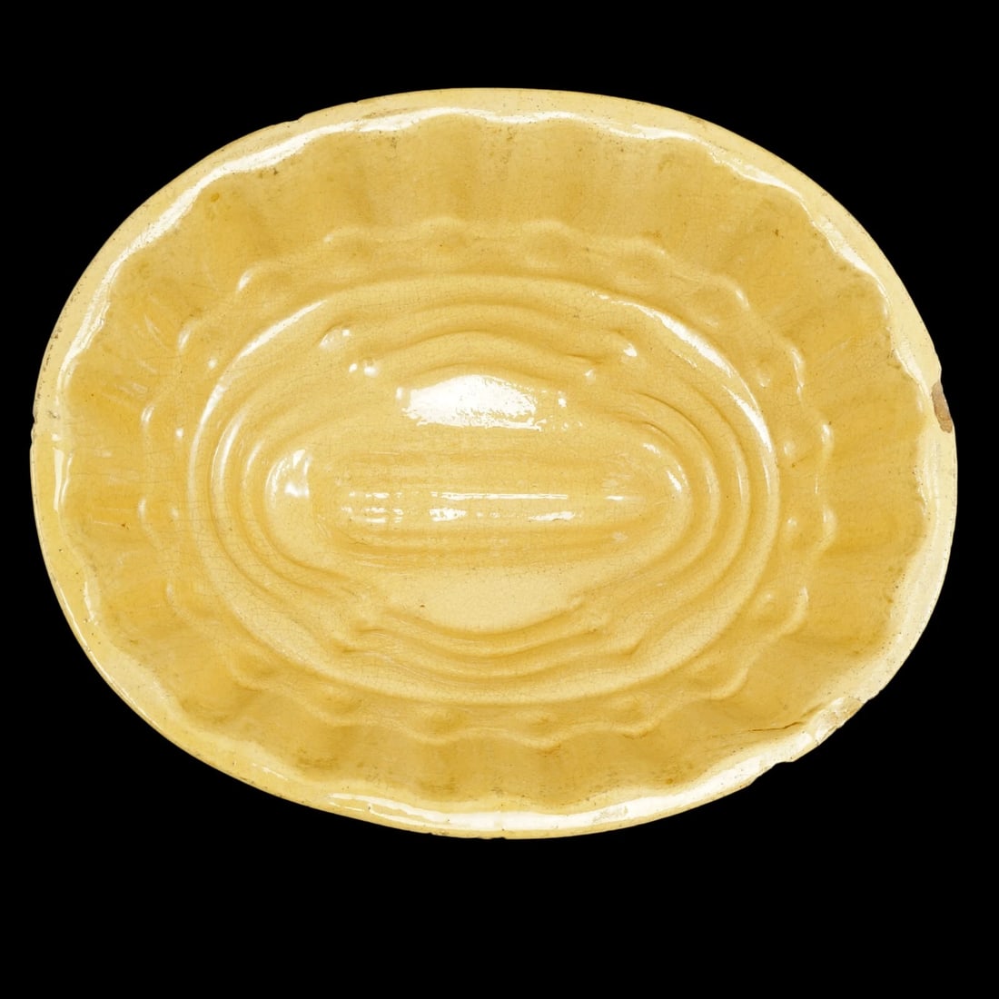Large Victorian Yellowware Corn Food Mold: Title:Large Victorian Yellowware Corn Food Mold Size:9 1/8 in (23.2 cm) long x 4 ½ in (11.4 cm) wide x 4 in (10.2 cm) tall. Description:A large antique yellowware ceramic food mold with a corn 