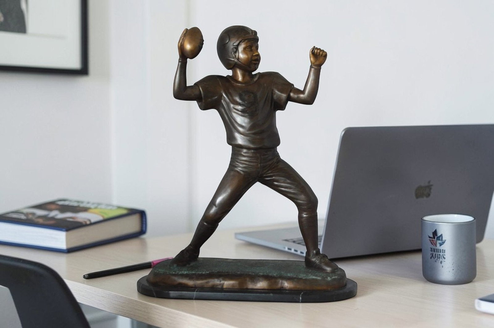 Young Quarterback bronze statue - Size: 14"L x 6"W x 20"H. - 2