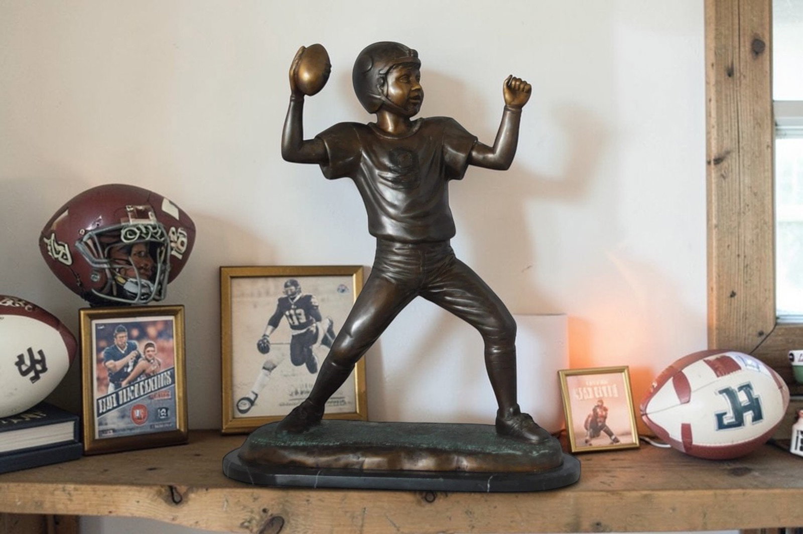 Young Quarterback bronze statue - Size: 14"L x 6"W x 20"H. - 3