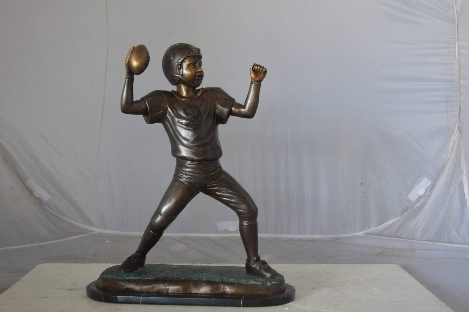 Young Quarterback bronze statue - Size: 14"L x 6"W x 20"H. - 4