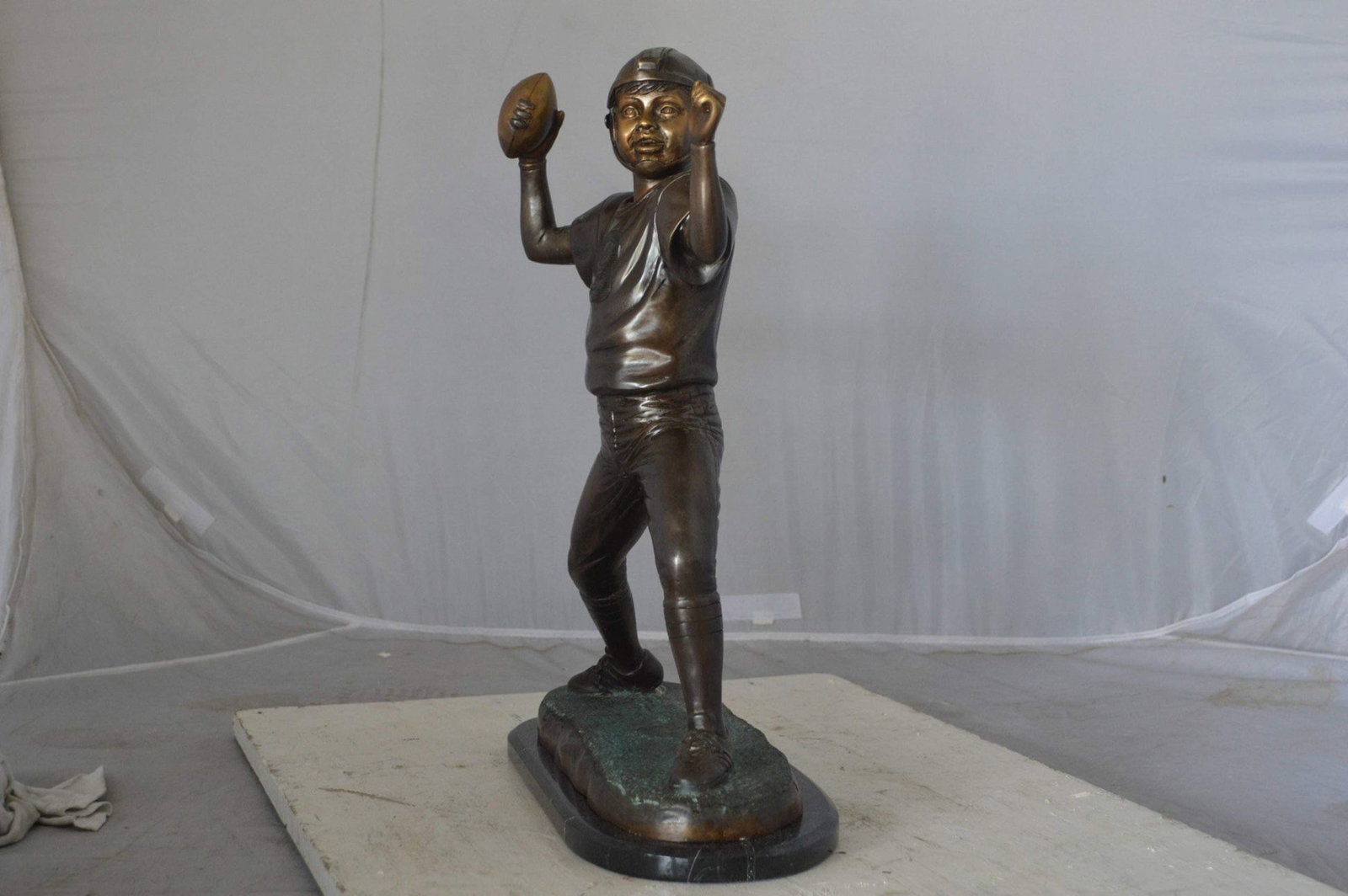Young Quarterback bronze statue - Size: 14"L x 6"W x 20"H. - 6