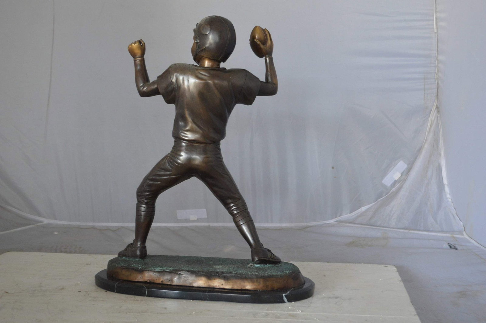 Young Quarterback bronze statue - Size: 14"L x 6"W x 20"H. - 9