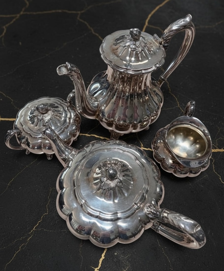 4 Pc Silver Plated Coffee and Tea Service Melon Pattern Sheffield Style Set: Title:4 Pc Silver Plated Coffee and Tea Service Melon Pattern Sheffield Style Set Description:This elegant four-piece coffee set features a classic melon design inspired by traditional Sheffield patte