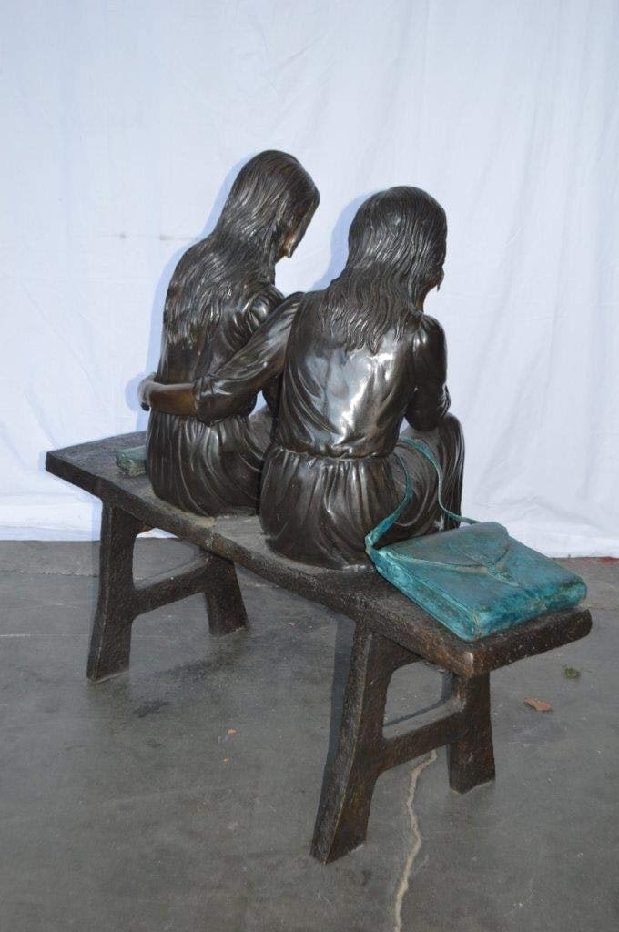 Two Schoolgirls Sitting On a Bench Bronze Statue - Size: 45"L x 24"W x 41"H. - 10