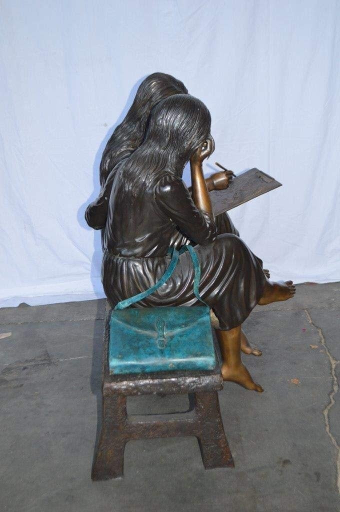 Two Schoolgirls Sitting On a Bench Bronze Statue - Size: 45"L x 24"W x 41"H. - 9
