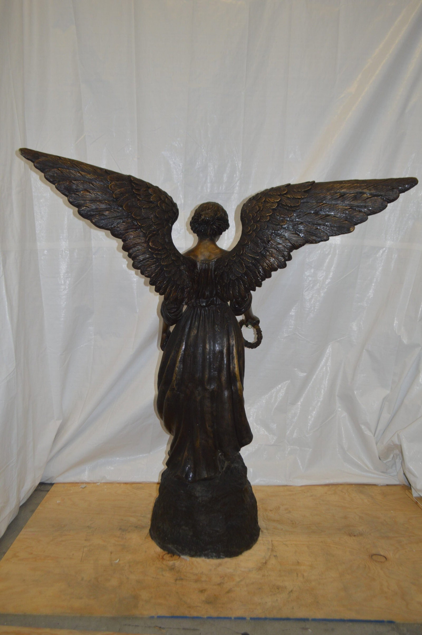 Angel Standing on a Rock Bronze Statue - Size: 60"L x 36"W x 71"H. - 5