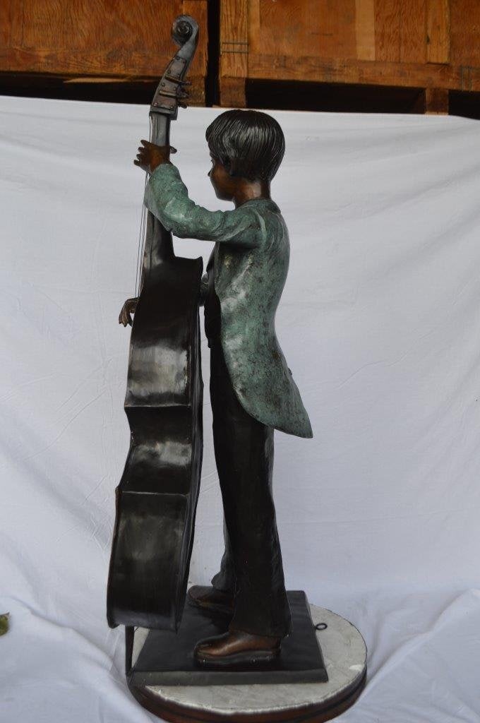 Boy playing cello large bronze statue - Size: 19"L x 22"W x 59"H. - 10