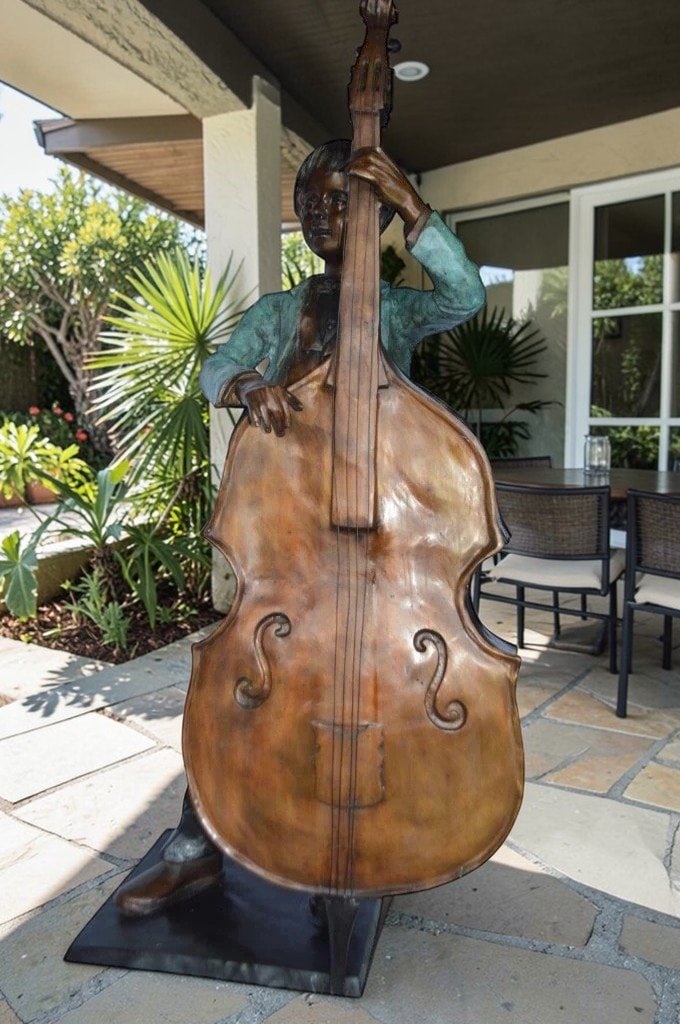 Boy playing cello large bronze statue - Size: 19"L x 22"W x 59"H. - 2